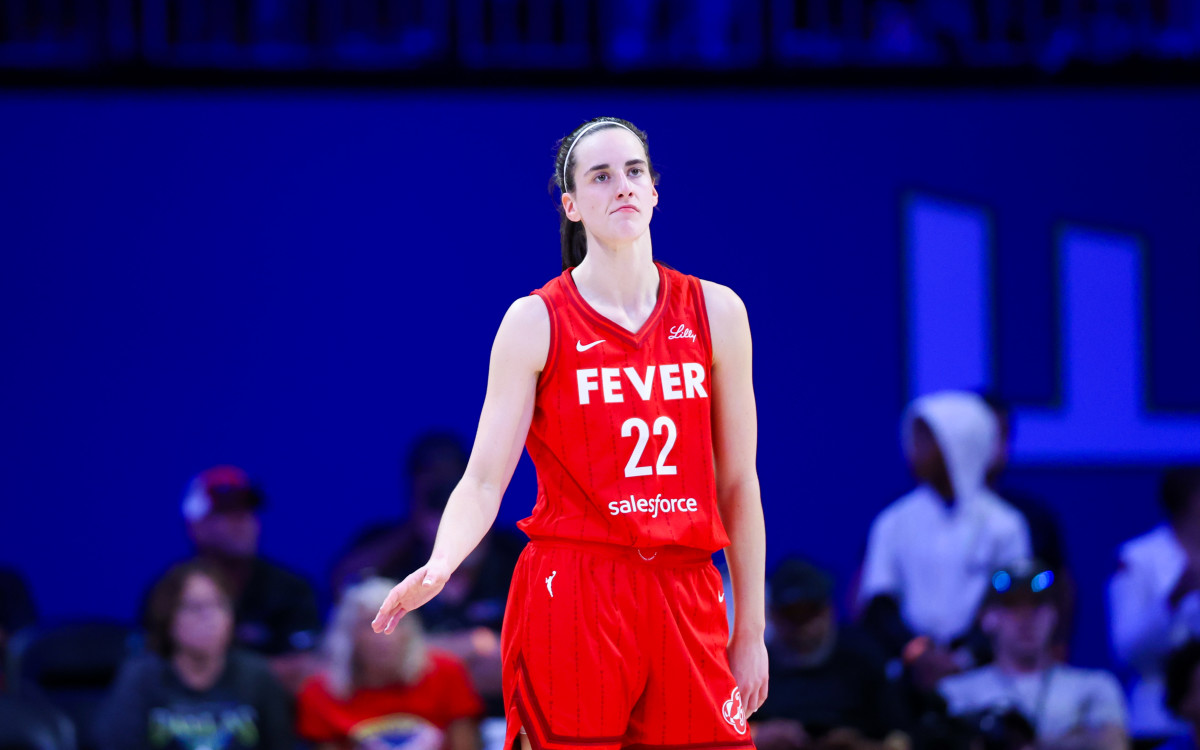 Jul 17, 2024; Arlington, Texas, USA; Indiana Fever guard Caitlin Clark (22) reacts during the second half against the Dallas Wings at College Park Center.