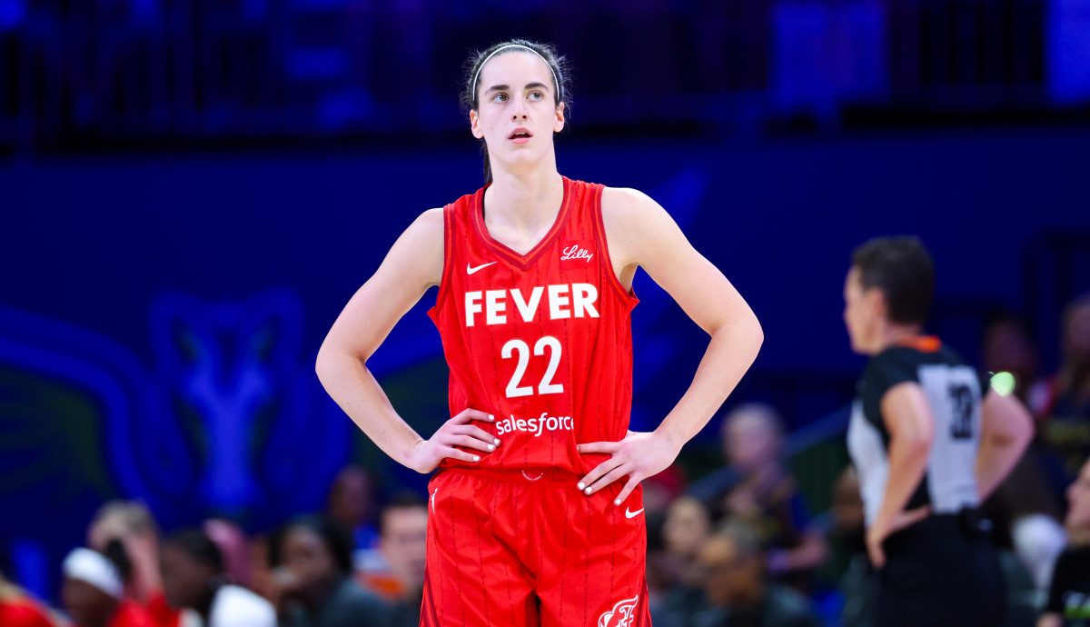 Jul 17, 2024; Arlington, Texas, USA; Indiana Fever guard Caitlin Clark (22) reacts during the first half against the Dallas Wings at College Park Center.