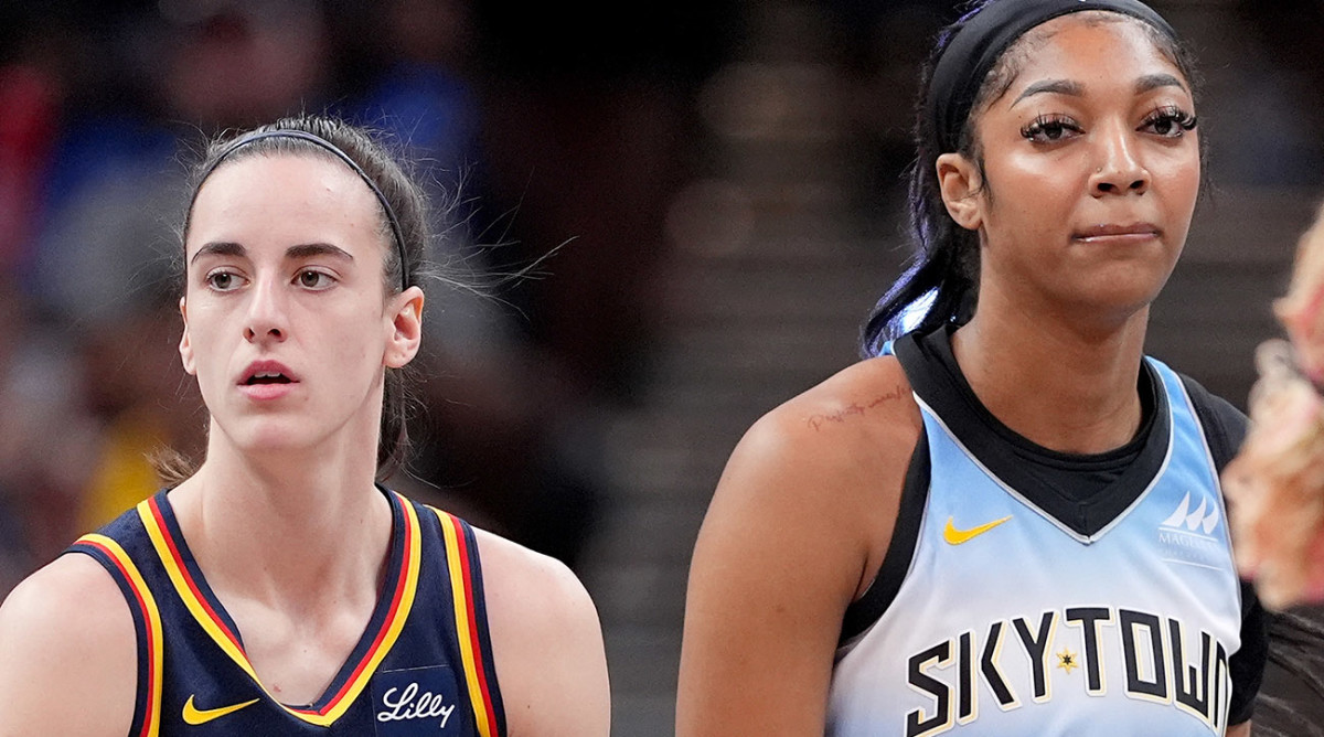 Caitlin Clark of the Indiana Fever and Angel Reese of the Chicago Sky look on during their game at Gainbridge Fieldhouse in Indianapolis on June 16, 2024.