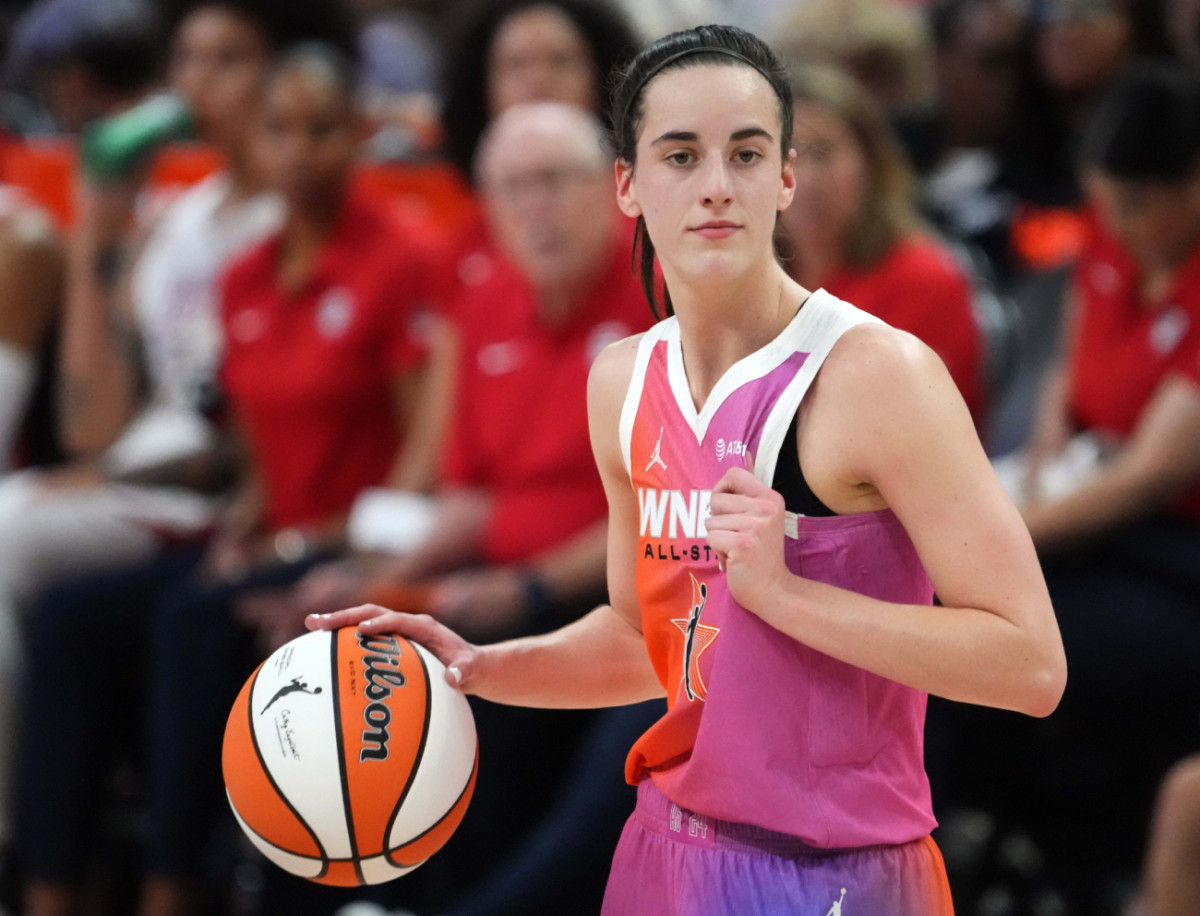 Team WNBA guard Caitlin Clark dribbles during the All Star Game at Footprint Center on July 20, 2024.