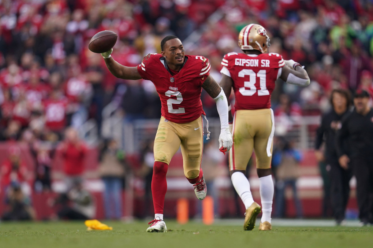 San Francisco 49ers cornerback Deommodore Lenoir (2) holds onto the ball.