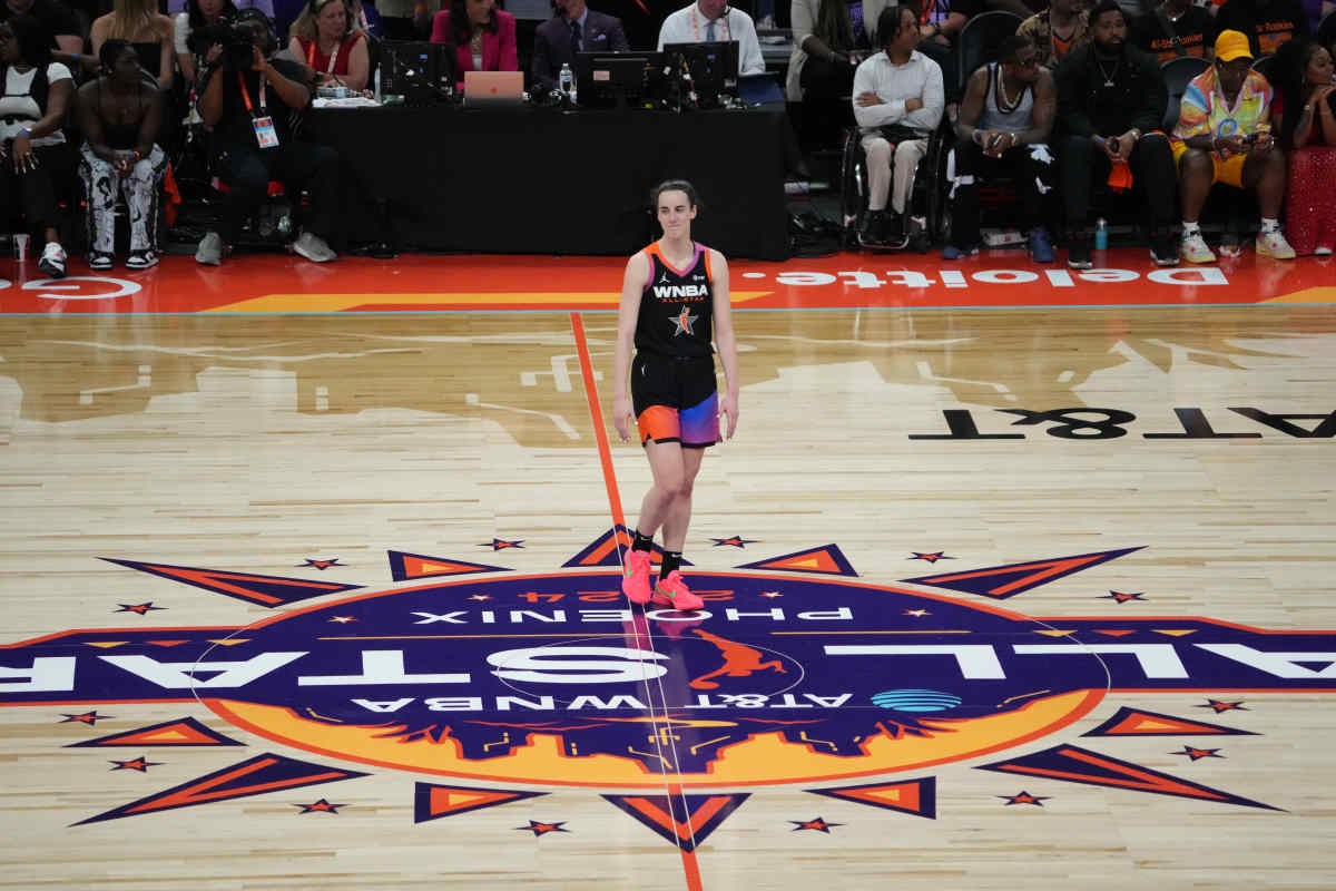 Jul 20, 2024; Phoenix, AZ, USA; Team WNBA guard Caitlin Clark (22) looks on during the WNBA All Star Game at Footprint Center.