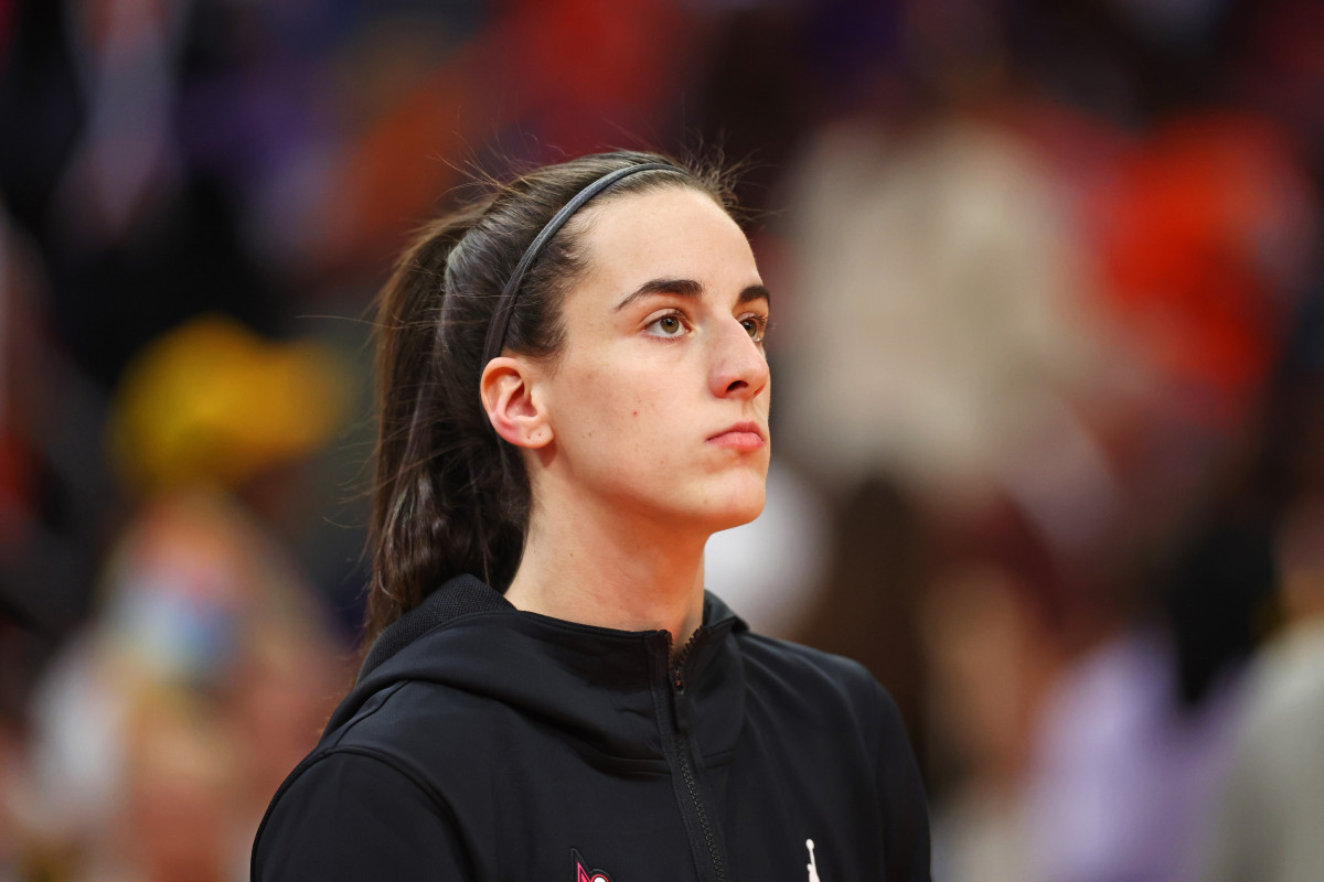 Jul 20, 2024; Phoenix, AZ, USA; Team WNBA guard Caitlin Clark (22) warms up before the game against the USA Women's National Team at Footprint Center. 