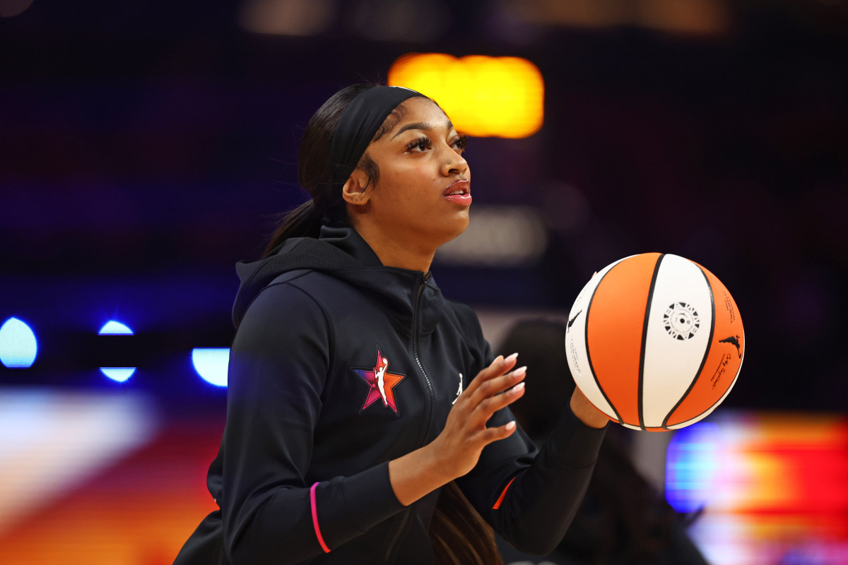 Team WNBA forward Angel Reese warms up before the WNBA All-Star Game against the USA women’s national team at Footprint Center in Phoenix on July 20, 2024.