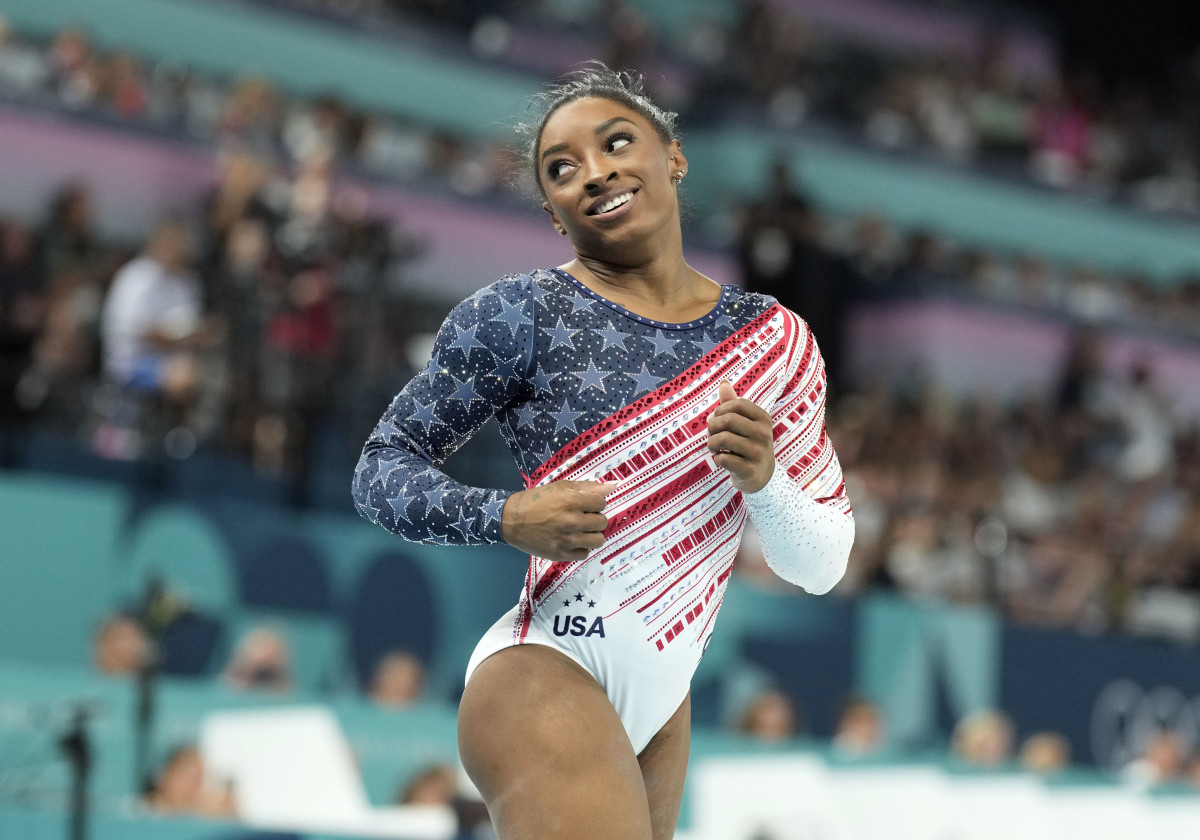 Jul 30, 2024; Paris, France; Simone Biles of the United States competes on the balance beam during the women’s team final at the Paris 2024 Olympic Summer Games at Bercy Arena.