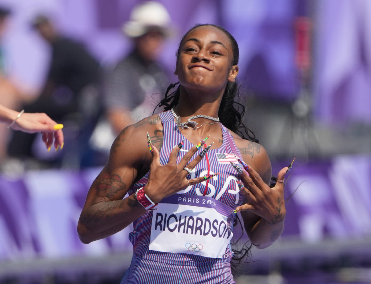 Sha'carri Richardson (USA) wins a women's 100m round 1 race during the Paris 2024 Olympic Summer Games at Stade de France.