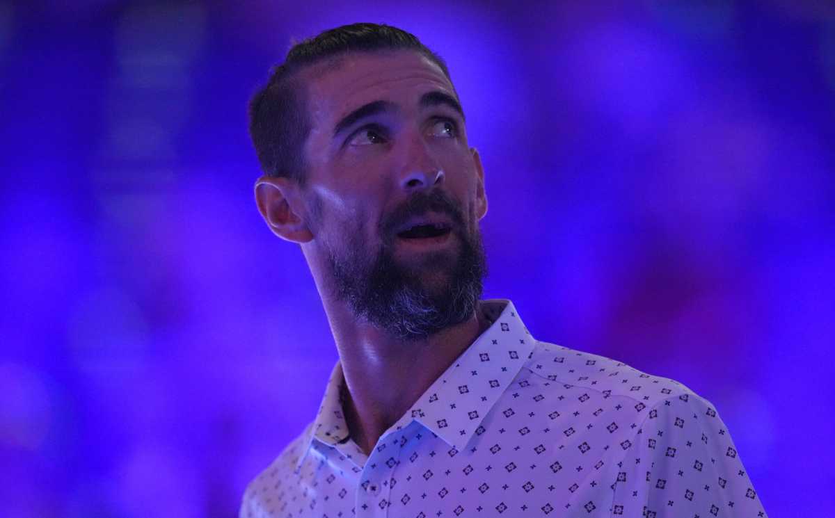 Michael Phelps looks up, Saturday, June 22, 2024, during the eighth day of the U.S. Olympic Team Swimming Trials at Lucas Oil Stadium in Indianapolis.