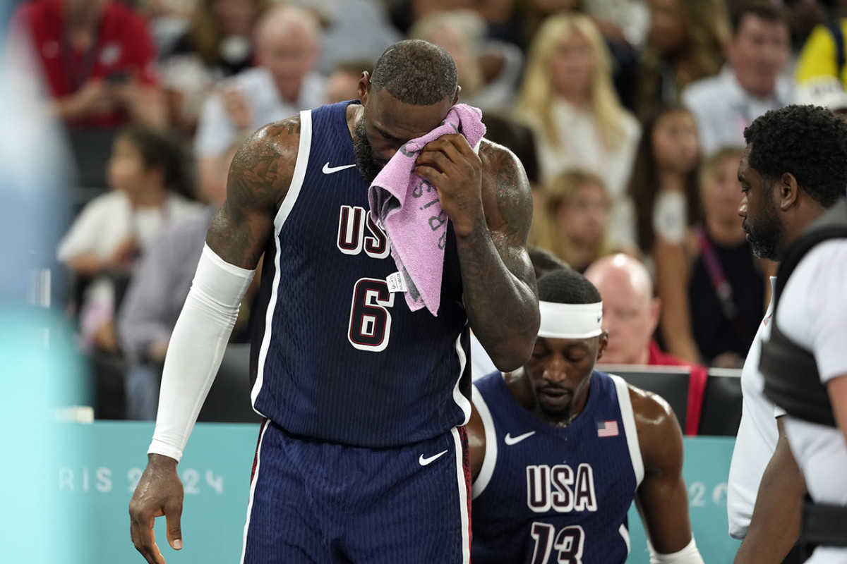 Aug 6, 2024; Paris, France; United States guard LeBron James (6) reacts after a play against Brazil in the third quarter in a men’s basketball quarterfinal game during the Paris 2024 Olympic Summer Games at Accor Arena.