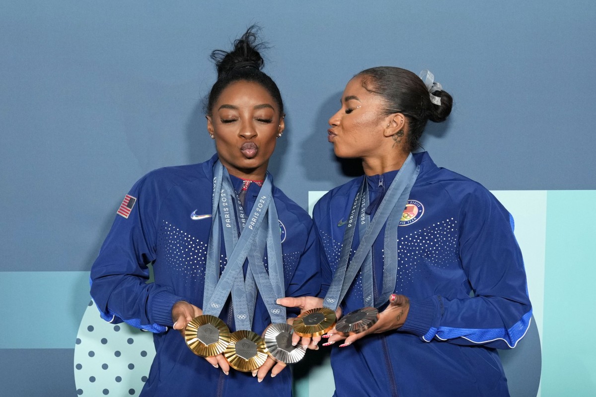 Simone Biles and Jordan Chiles of the United States pose for a photo during the Paris 2024 Olympics.