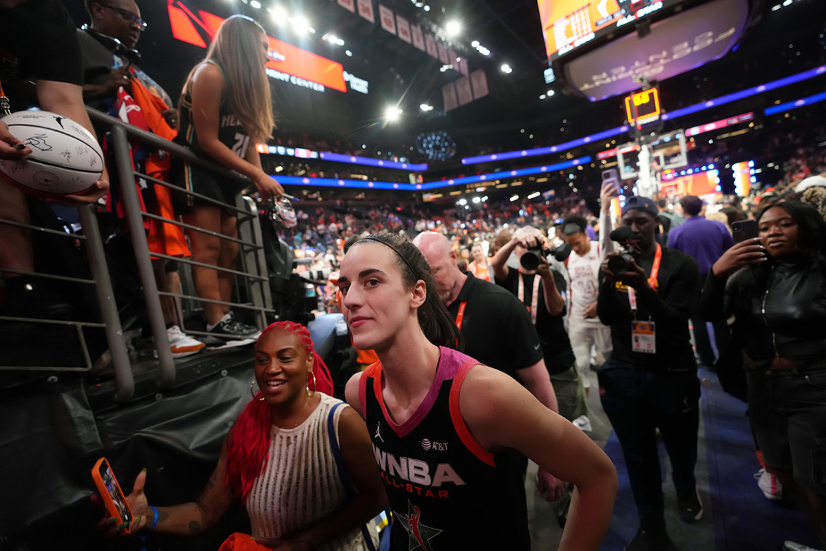 Team WNBA guard Caitlin Clark (22) walks off the floor after the WNBA All-Star Game at Footprint Center in Phoenix on July 20, 2024.