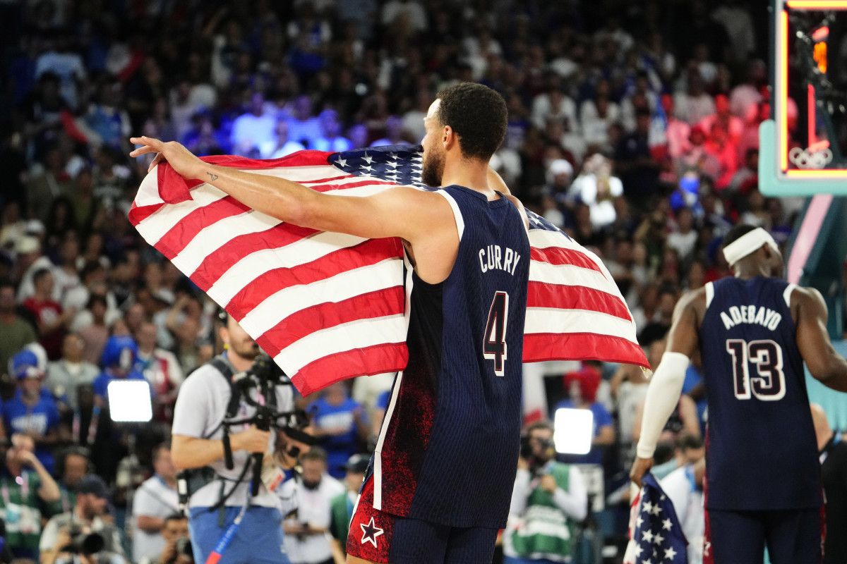 Stephen Curry And Sha’Carri Richardson Embrace After Gold Medal Victory