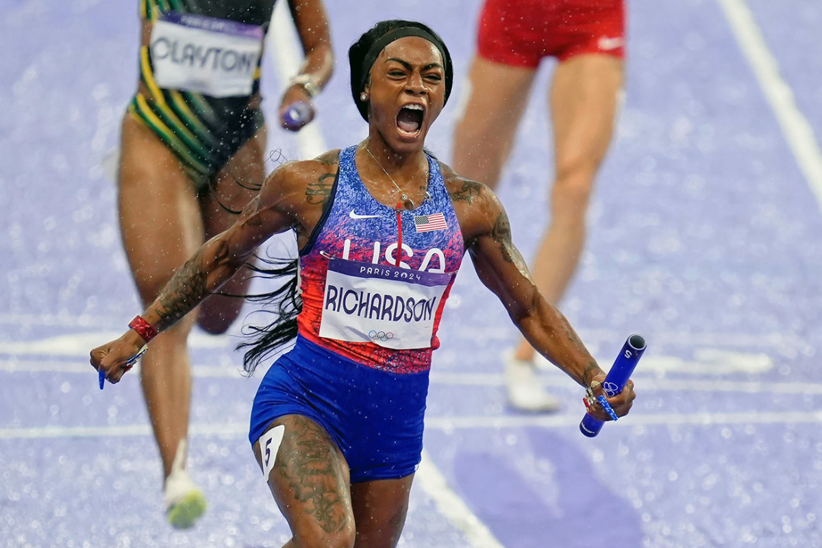 Aug 9, 2024; Paris Saint-Denis, France; Sha'carri Richardson (USA) celebrates after winning the womenÌs 4x100m relay during the Paris 2024 Olympic Summer Games at Stade de France.