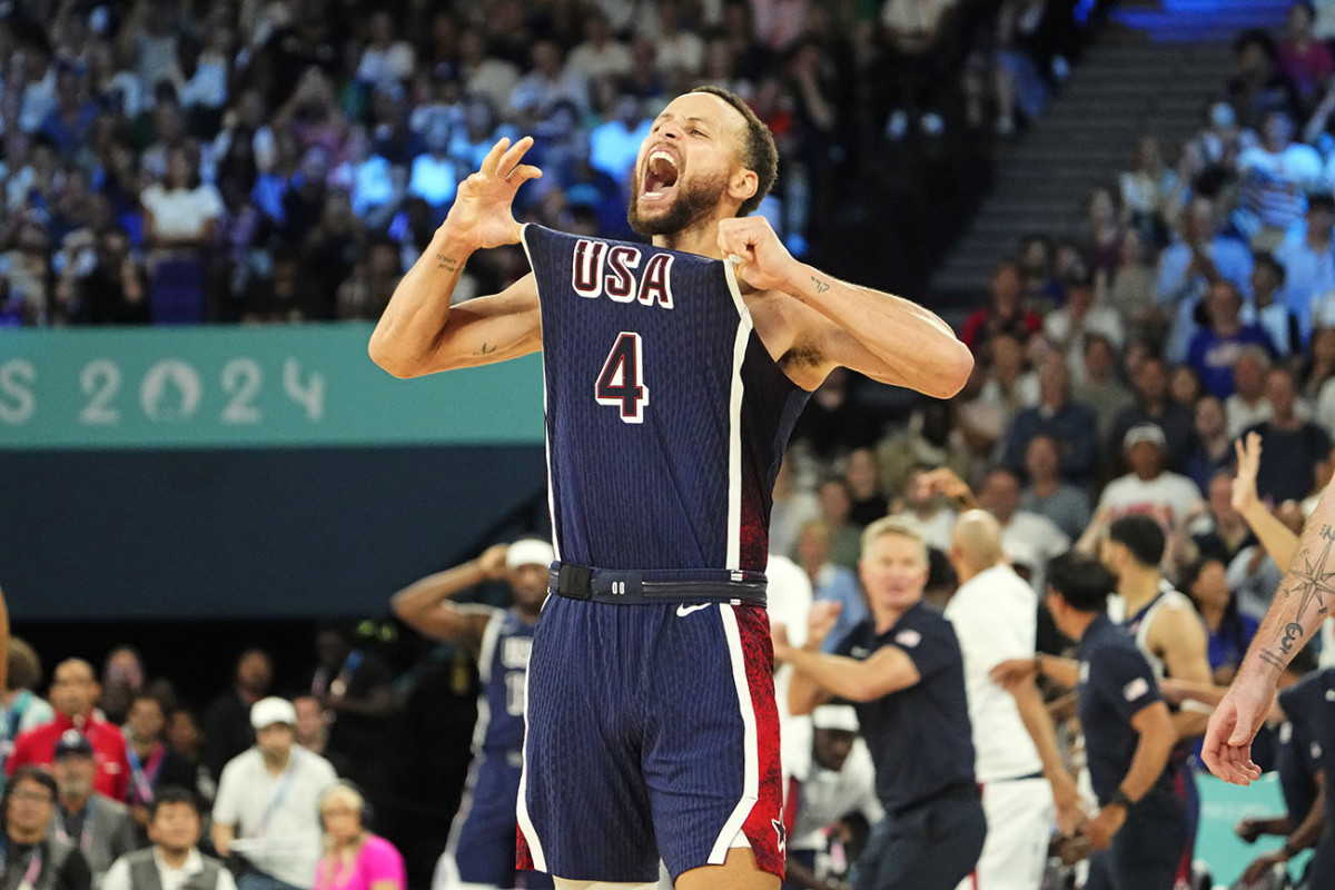 Aug 10, 2024; Paris, France; United States shooting guard Stephen Curry (4) celebrates in the second half against France in the men's basketball gold medal game during the Paris 2024 Olympic Summer Games at Accor Arena.