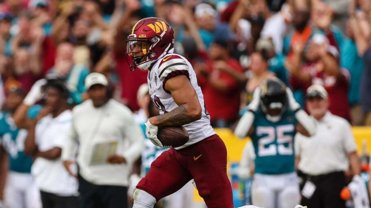 Sep 11, 2022; Landover, Maryland, USA; Washington Commanders safety Darrick Forrest (22) celebrates after intercepting a pass against the Jacksonville Jaguars during the second half at FedExField.