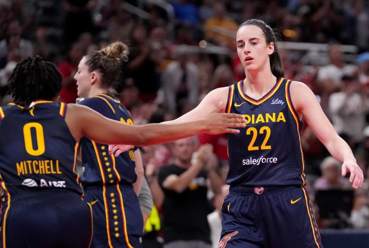 Indiana Fever guard Caitlin Clark (22) and guard Kelsey Mitchell (0)