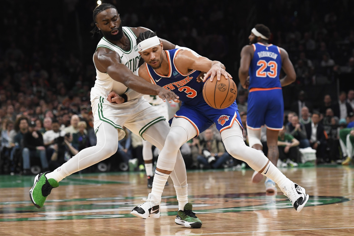 Boston Celtics guard Jaylen Brown (7) tries to steal the ball from New York Knicks guard Josh Hart (3) during the second half at TD Garden
