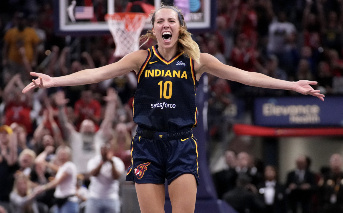 Indiana Fever guard Lexie Hull (10) celebrates after scoring a three-point field goal against the Seattle Storm