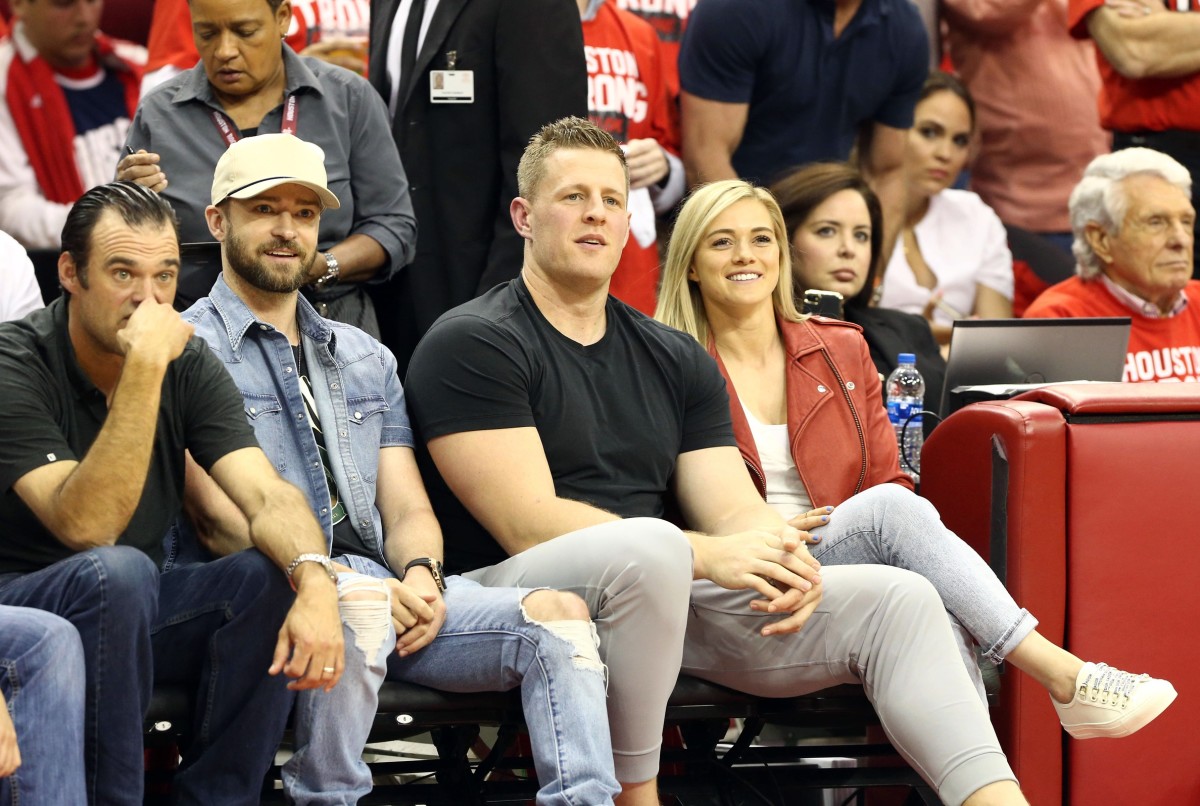 USA: Singer Justin Timberlake and Houston Texans defensive end J.J. Watt and girlfriend Kealia Ohai sit on the sideline during game five of the Western conference finals of the 2018 NBA Playoffs