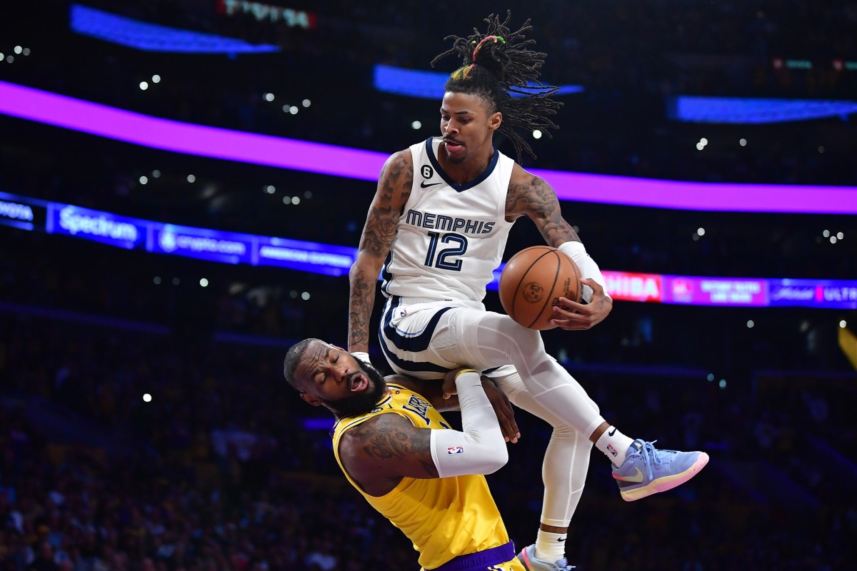 Fans in Disbelief After Ja Morant Limps to Locker Room vs. LeBron James