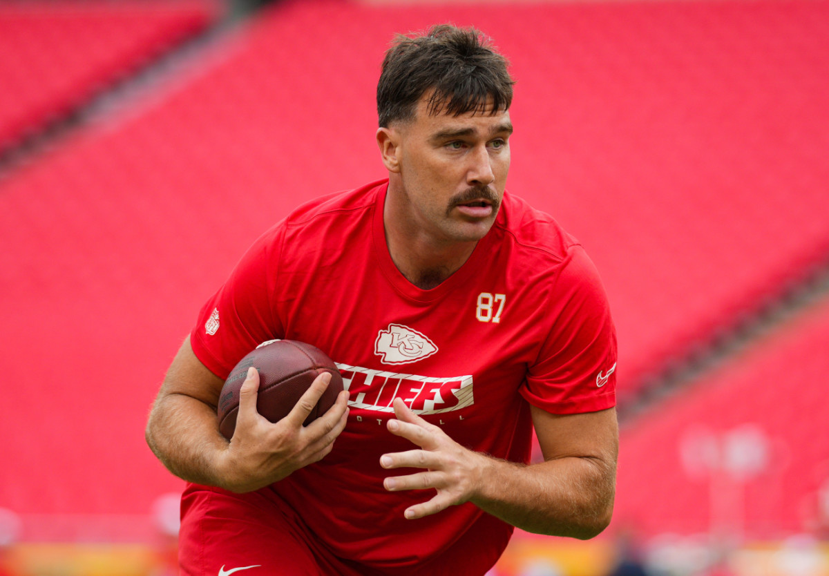 Kansas City Chiefs tight end Travis Kelce warms up prior to a game against the Chicago Bears at Arrowhead Stadium on August 22, 2024.