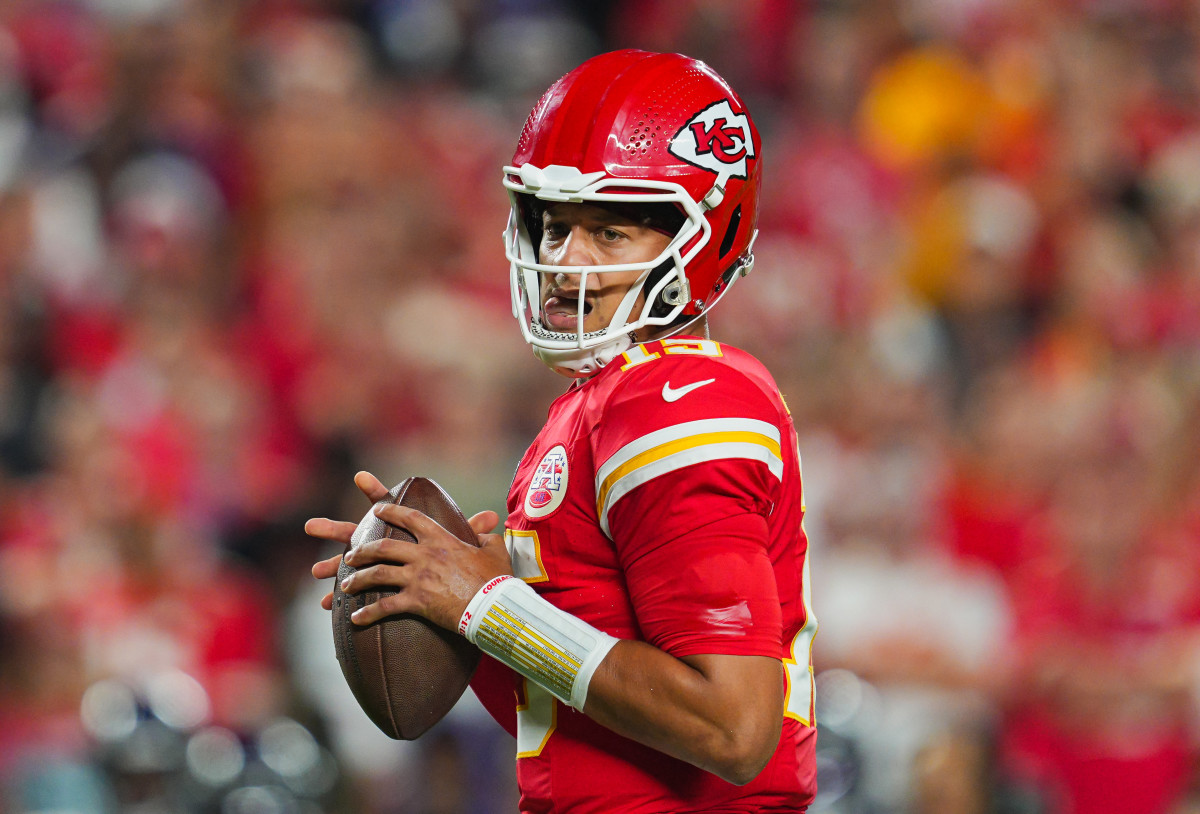 Sep 5, 2024; Kansas City, Missouri, USA; Kansas City Chiefs starting quarterback Patrick Mahomes (15) drops back to pass during the first half against the Baltimore Ravens at GEHA Field at Arrowhead Stadium.