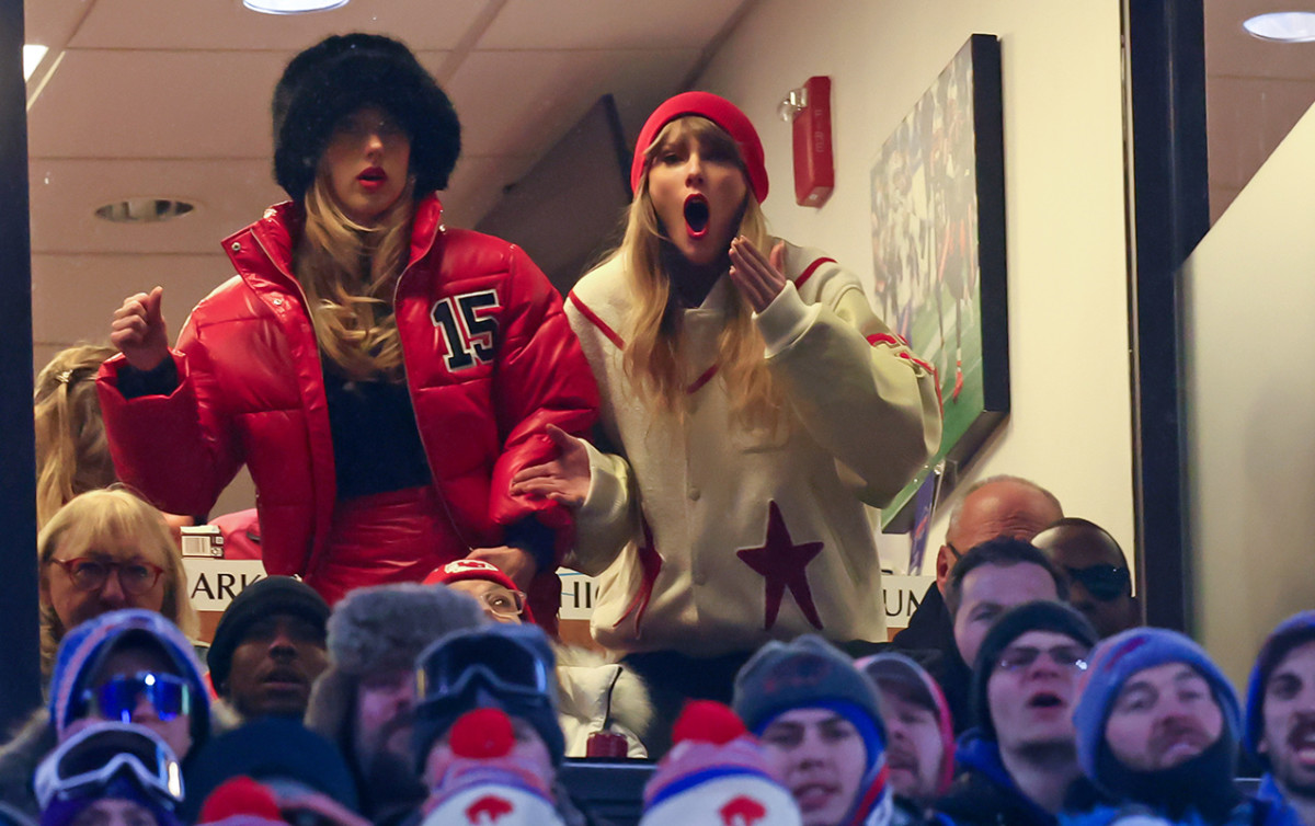 Jan 21, 2024; Orchard Park, New York, USA; Taylor Swift (right) and Brittany Mahomes react after Kansas City Chiefs tight end Travis Kelce (not pictured) scores a touchdown in the 2024 AFC divisional round game between against the Buffalo Bills at Highmark Stadium.