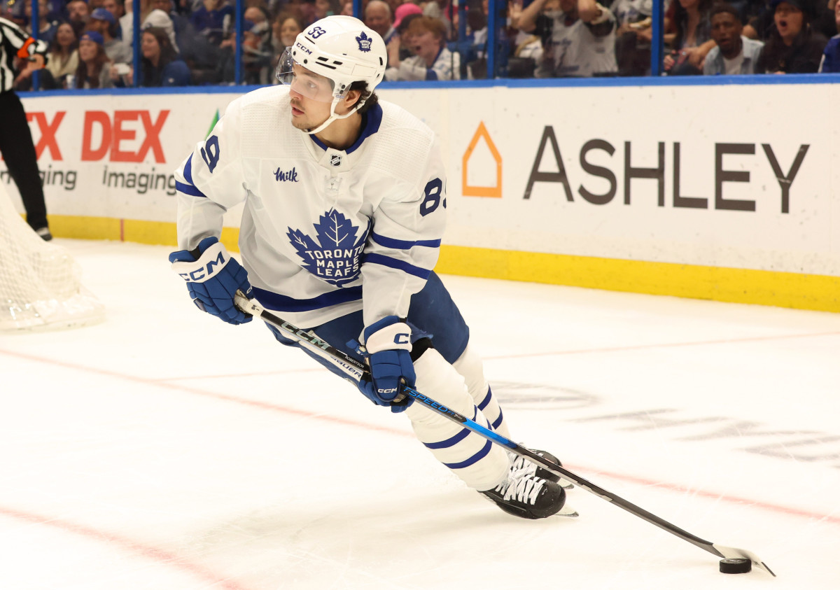 Toronto Maple Leafs left wing Nicholas Robertson (89) skates with the puck.