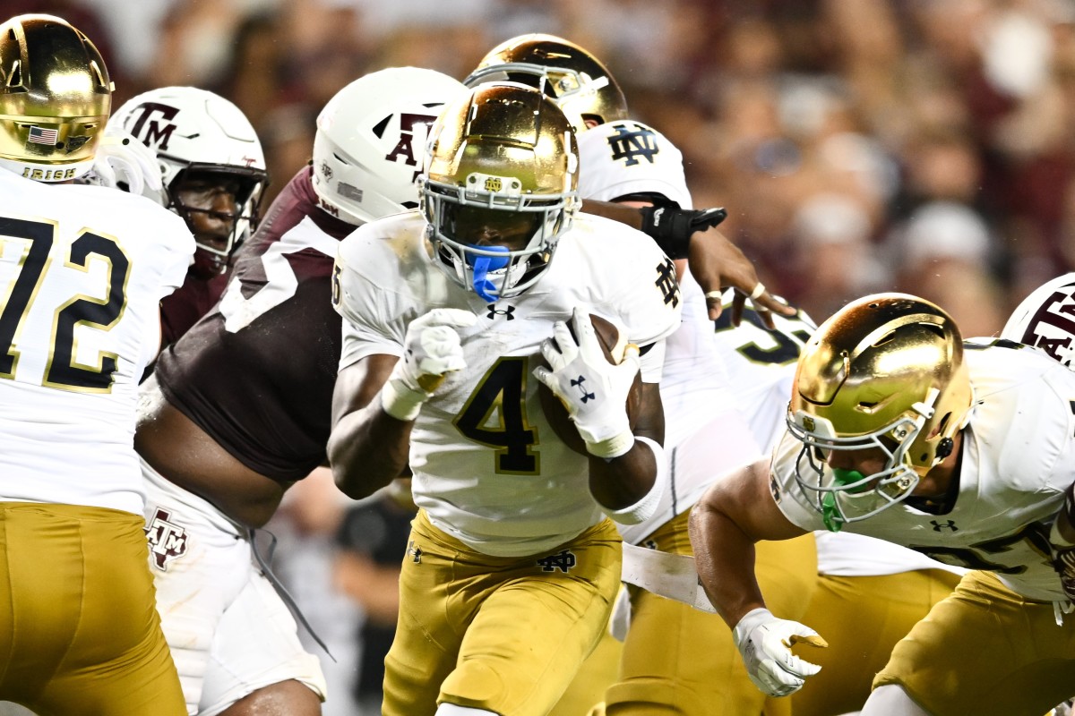 Notre Dame RB's Viral Hurdle Over Defender Leads to Highlight-Reel ...