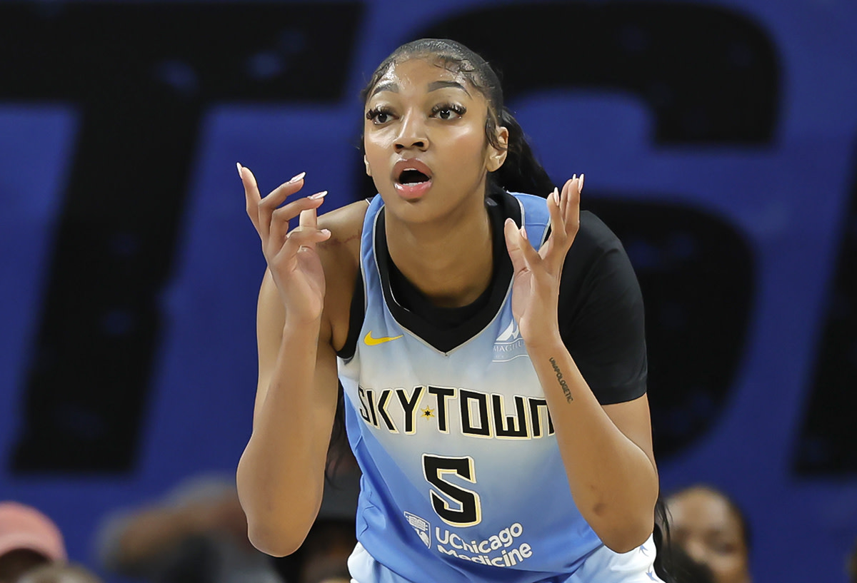 Jul 13, 2024; Chicago, Illinois, USA; Chicago Sky forward Angel Reese (5) reacts during the first half of a WNBA game against the New York Liberty at Wintrust Arena.