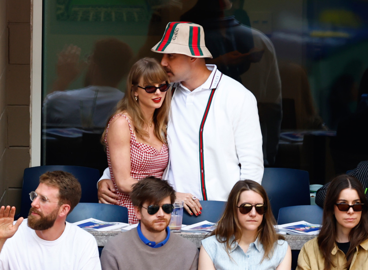 Taylor Swift and Kansas City Chiefs tight end Travis Kelce look on in the men’s singles final of the 2024 U.S. Open tennis tournament.