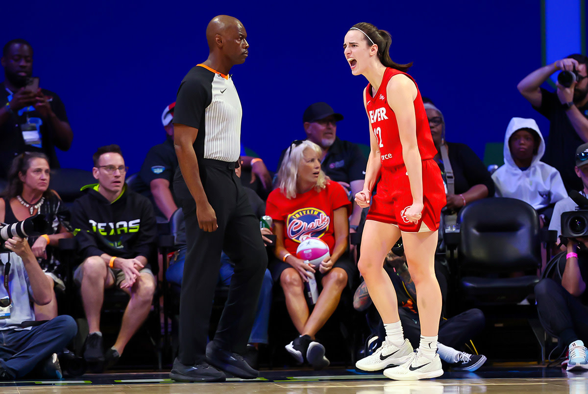 Jul 17, 2024; Arlington, Texas, USA; Indiana Fever guard Caitlin Clark (22) reacts after scoring during the first half against the Dallas Wings at College Park Center.