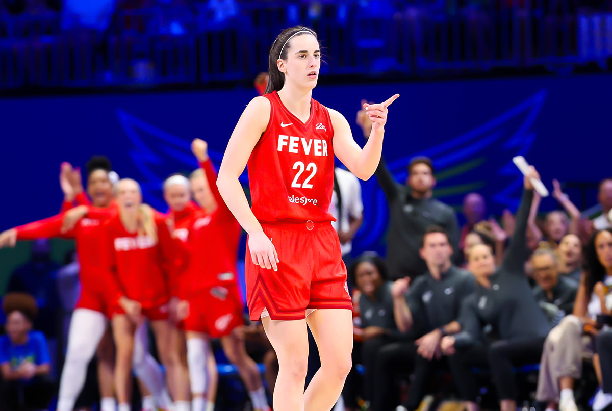 Indiana Fever guard Caitlin Clark (22) reacts during the second half against the Dallas Wings at College Park Center.