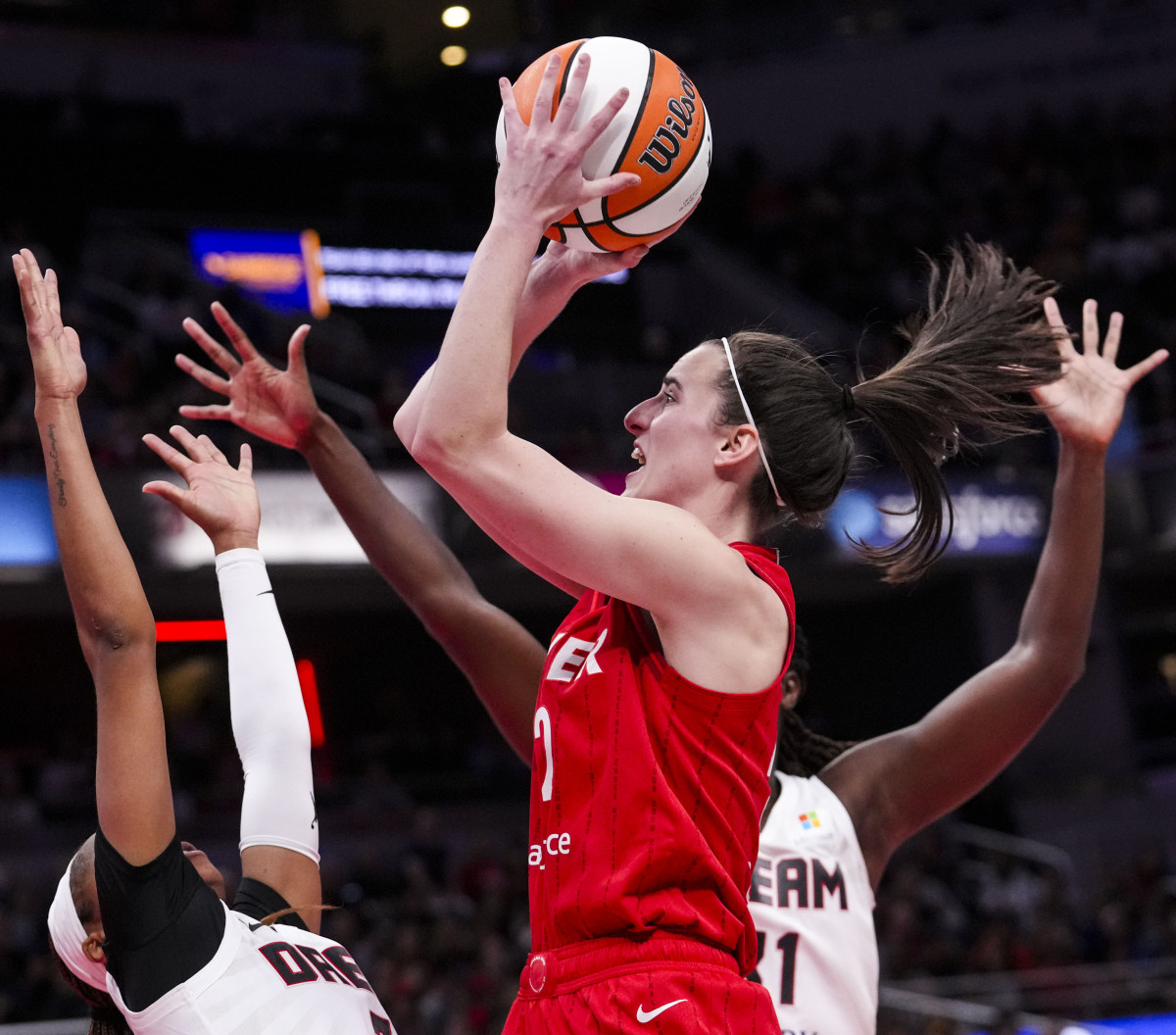 Indiana Fever guard Caitlin Clark (22) goes up for a shot Sunday, Sept. 8, 2024, during a game between the Indiana Fever and the Atlanta Dream at Gainbridge Fieldhouse.