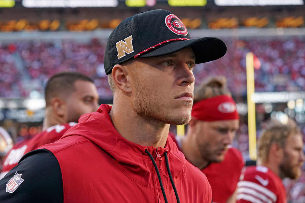 San Francisco 49ers running back Christian McCaffrey (23) watches injured from the sidelines in the second quarter against the New York Jets at Levi's Stadium.