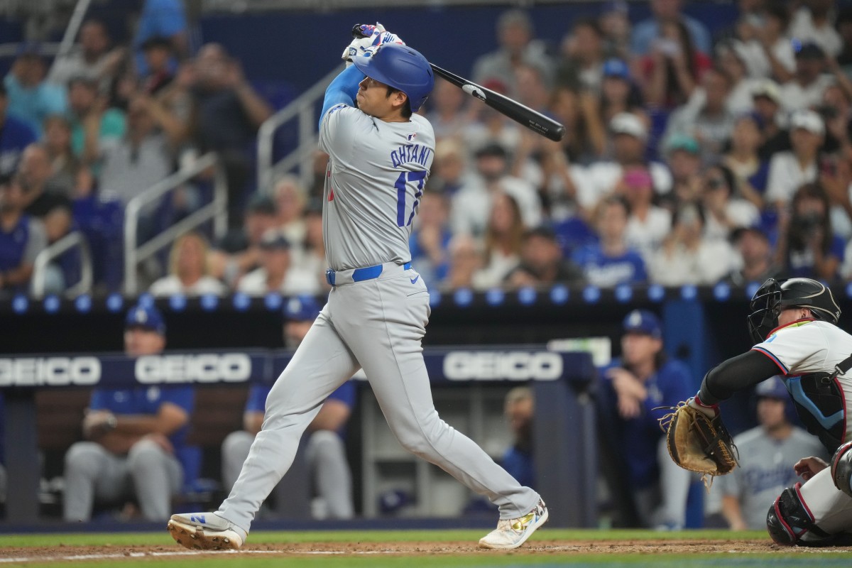 Miami, Florida, USA; Los Angeles Dodgers designated hitter Shohei Ohtani (17) hits a two-run home run in the third inning against the Miami Marlins at loanDepot Park - Jim Rassol-Imagn Images