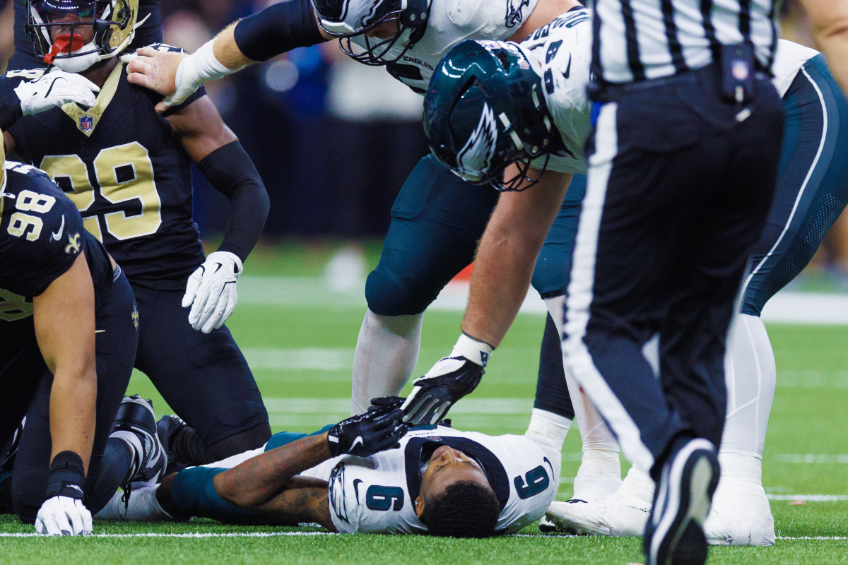 Philadelphia Eagles wide receiver DeVonta Smith (6) is injured on a tackle by New Orleans Saints defensive tackle Khristian Boyd (97)