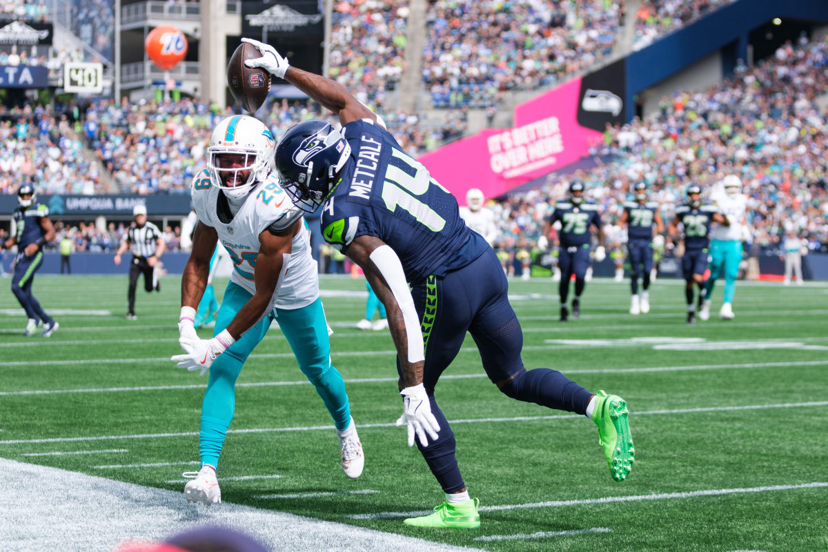 Sep 22, 2024; Seattle, Washington, USA; Seattle Seahawks wide receiver DK Metcalf (14) makes a catch during the first quarter against Miami Dolphins at Lumen Field.