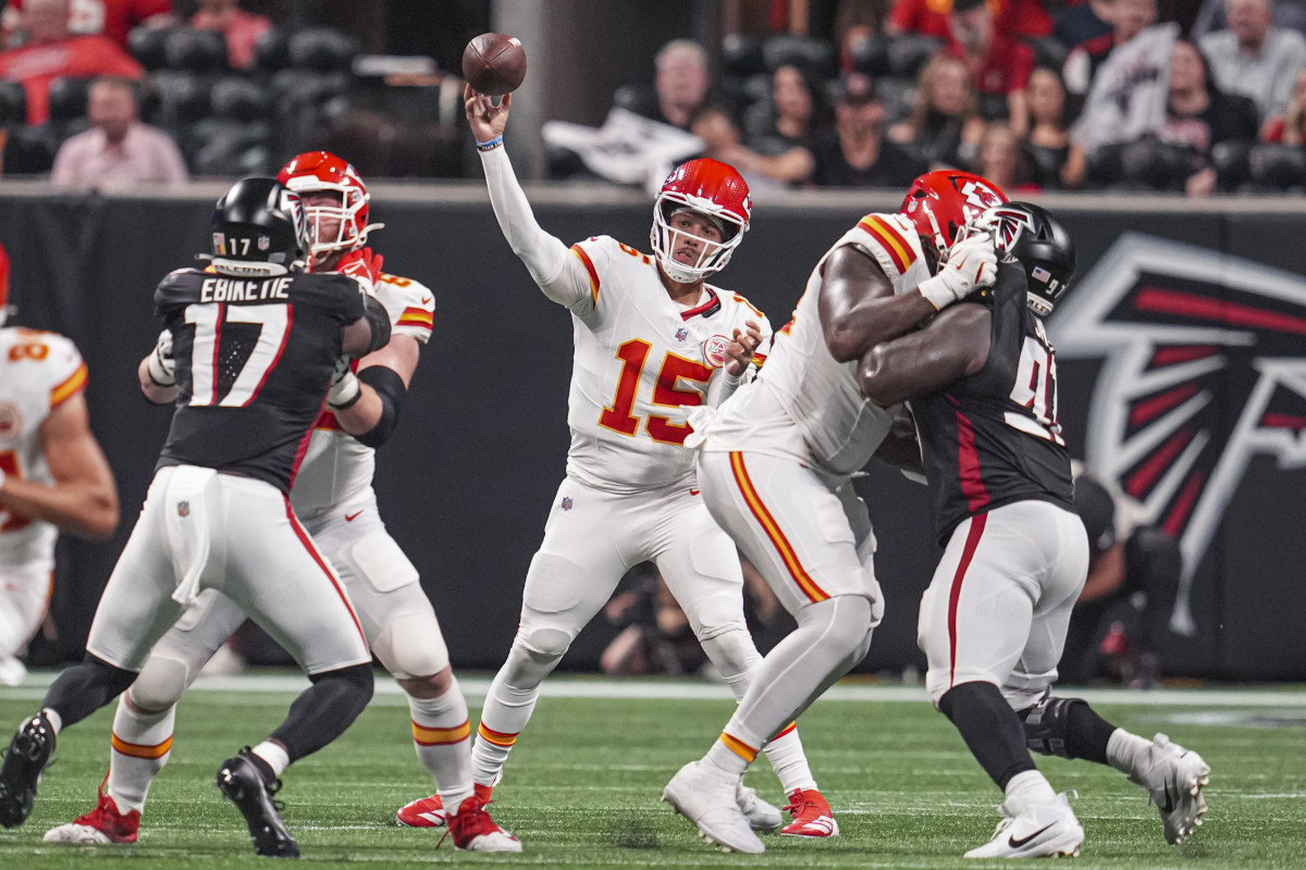 Sep 22, 2024; Atlanta, Georgia, USA; Kansas City Chiefs quarterback Patrick Mahomes (15) passes the ball against the Atlanta Falcons during the first half at Mercedes-Benz Stadium