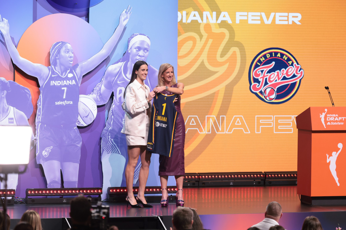 Indiana Fever guard Caitlin Clark and WNBA commissioner Cathy Engelbert.