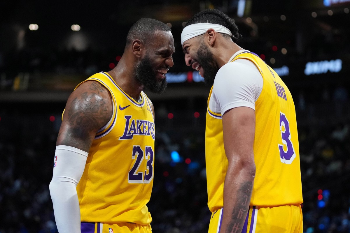 Los Angeles Lakers forward LeBron James and forward Anthony Davis celebrate.