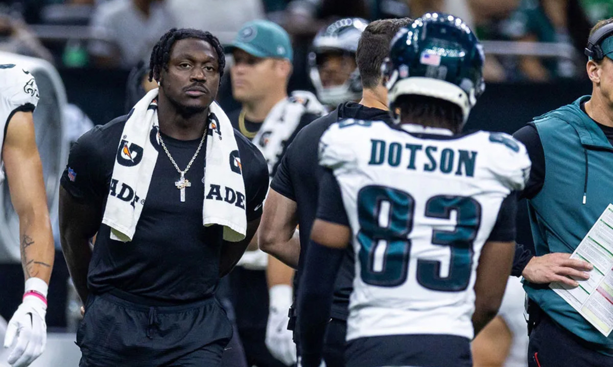 Philadelphia Eagles wide receiver A.J. Brown (11) in street clothes due to injury looks on against the New Orleans Saints during the first half at Caesars Superdome.