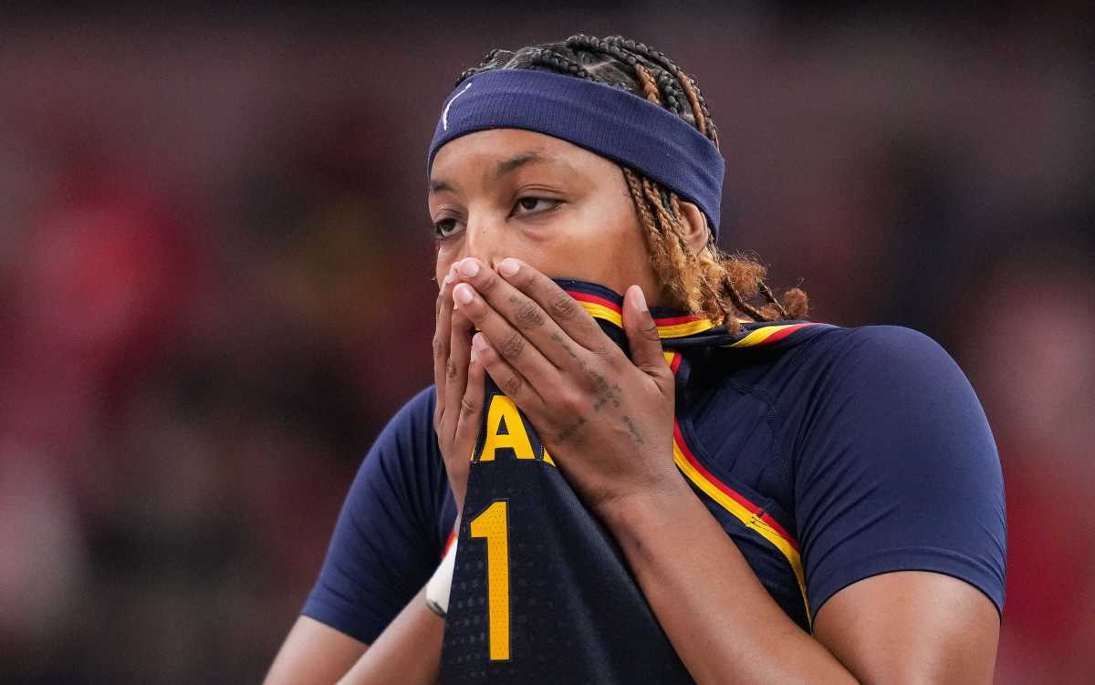 Cameras Catch NaLyssa Smith's Reaction to What Fan Told Caitlin Clark -  Athlon Sports