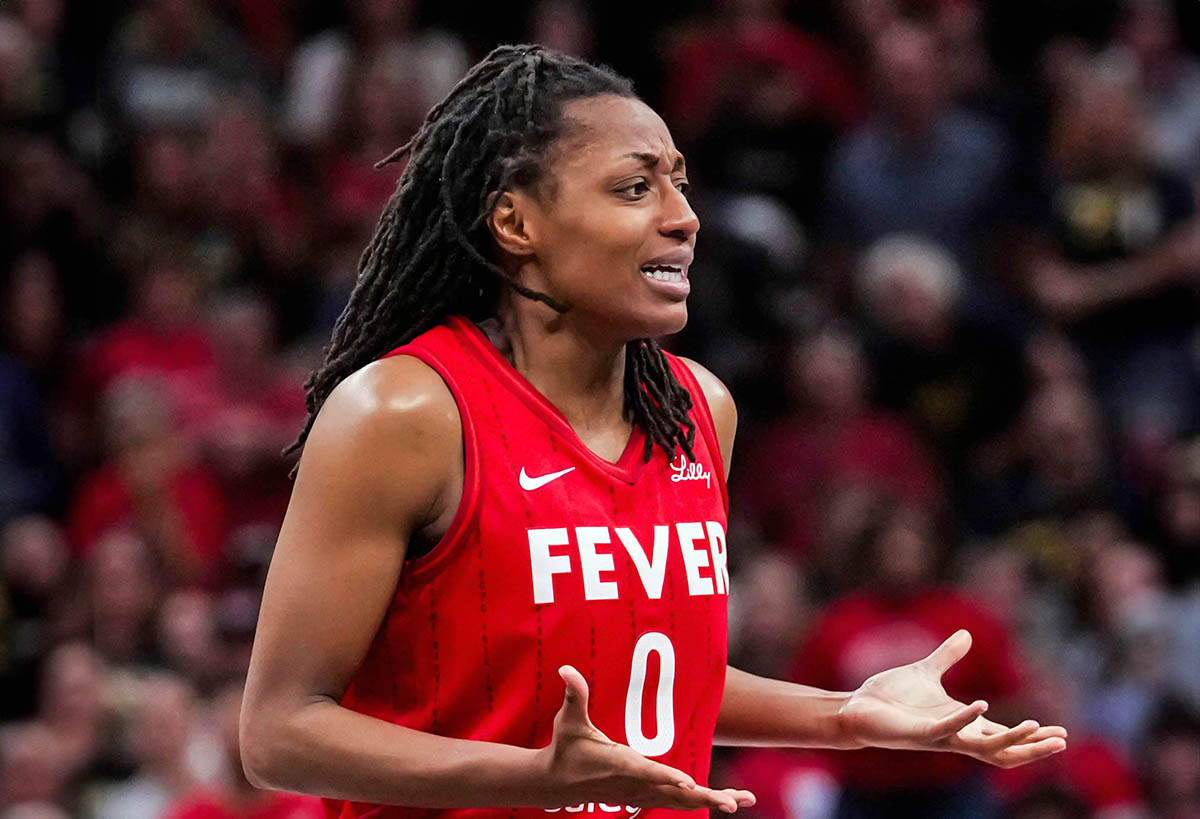 Indiana Fever guard Kelsey Mitchell (0) reacts to a call Wednesday, Sept. 11, 2024, during a game between the Indiana Fever and the Las Vegas Aces at Gainbridge Fieldhouse in Indianapolis. The Aces defeated the Fever, 86-75.