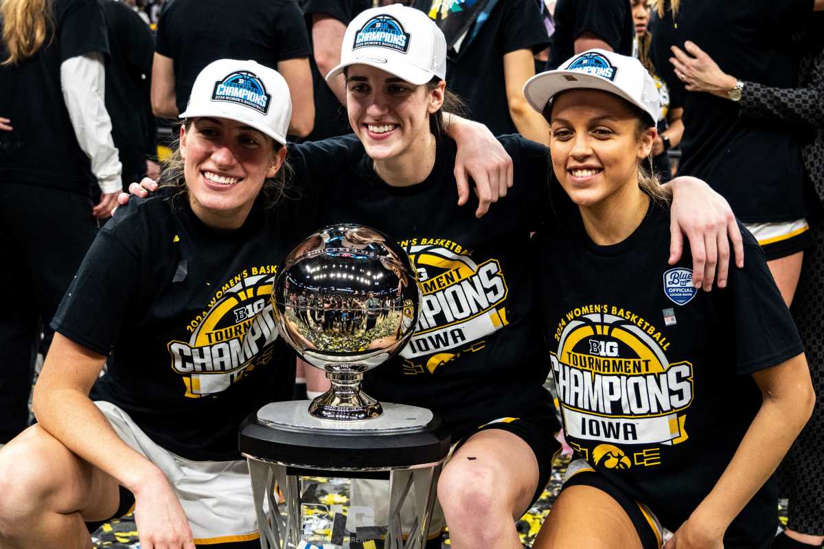 Iowa guards Kate Martin (20), Caitlin Clark (22) and Gabbie Marshall (24)