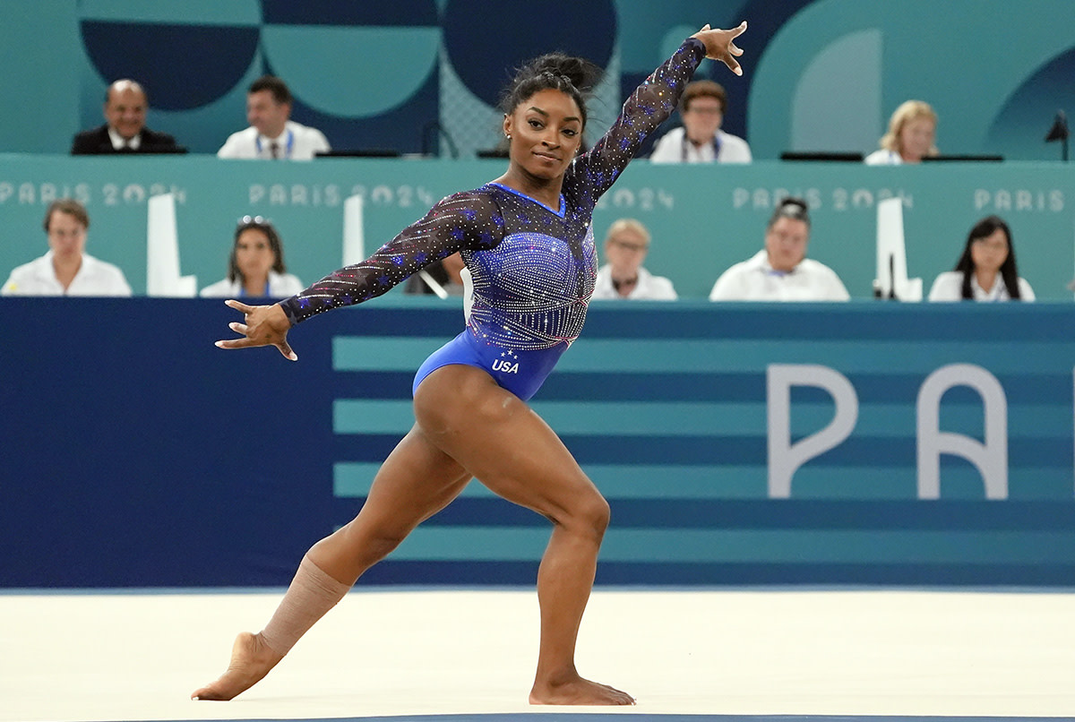 Aug 1, 2024; Paris, France; Simone Biles of the United States competes on the floor exercise in the womenís gymnastics all-around during the Paris 2024 Olympic Summer Games at Bercy Arena.