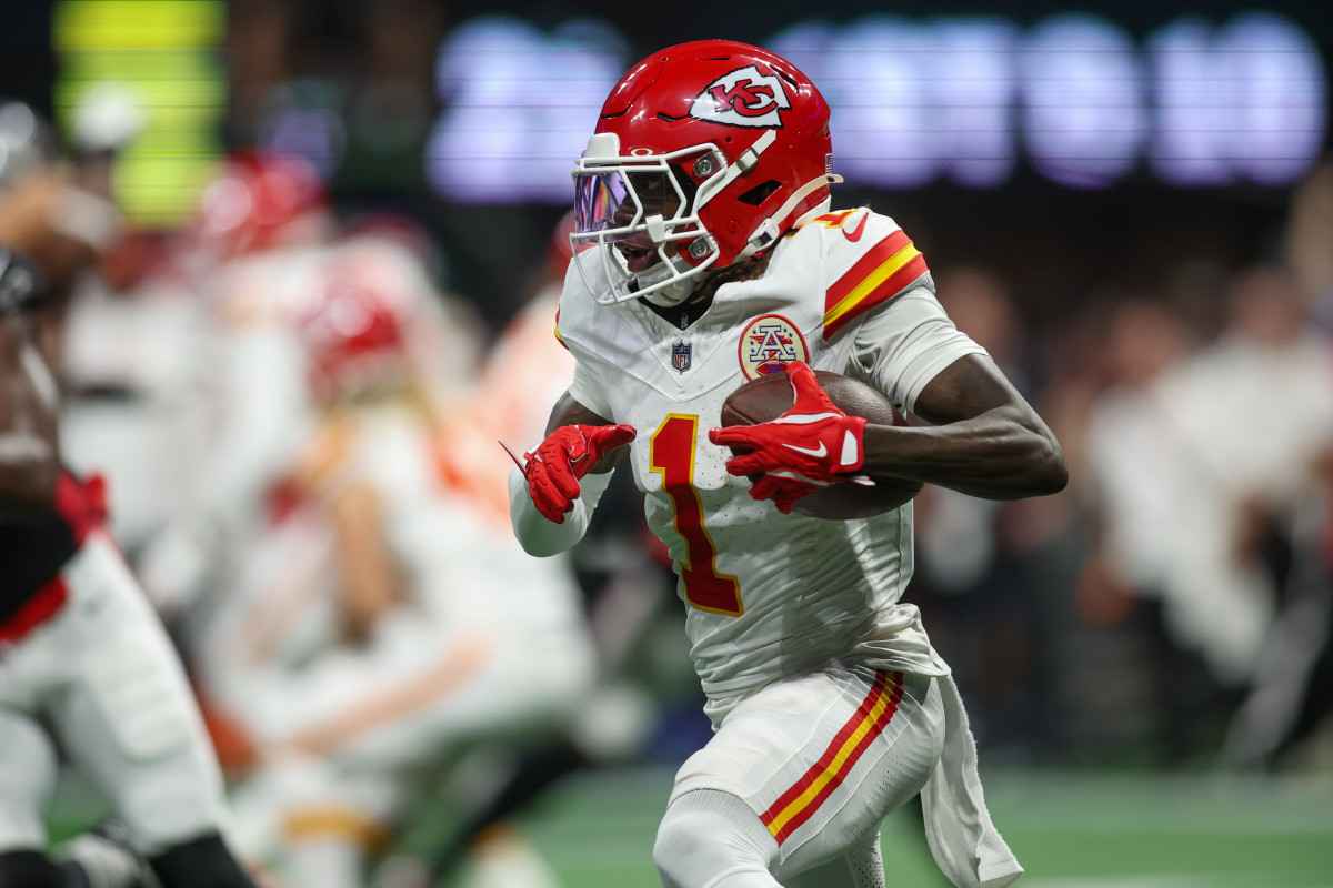 Sep 22, 2024; Atlanta, Georgia, USA; Kansas City Chiefs wide receiver Xavier Worthy (1) runs after a catch against the Atlanta Falcons in the first quarter at Mercedes-Benz Stadium.