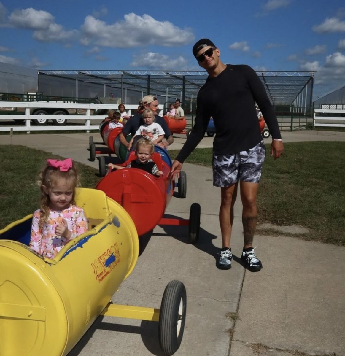 Chiefs quarterback Patrick Mahomes poses with his kids, Sterling, and Bronze, on September 30, 2024.