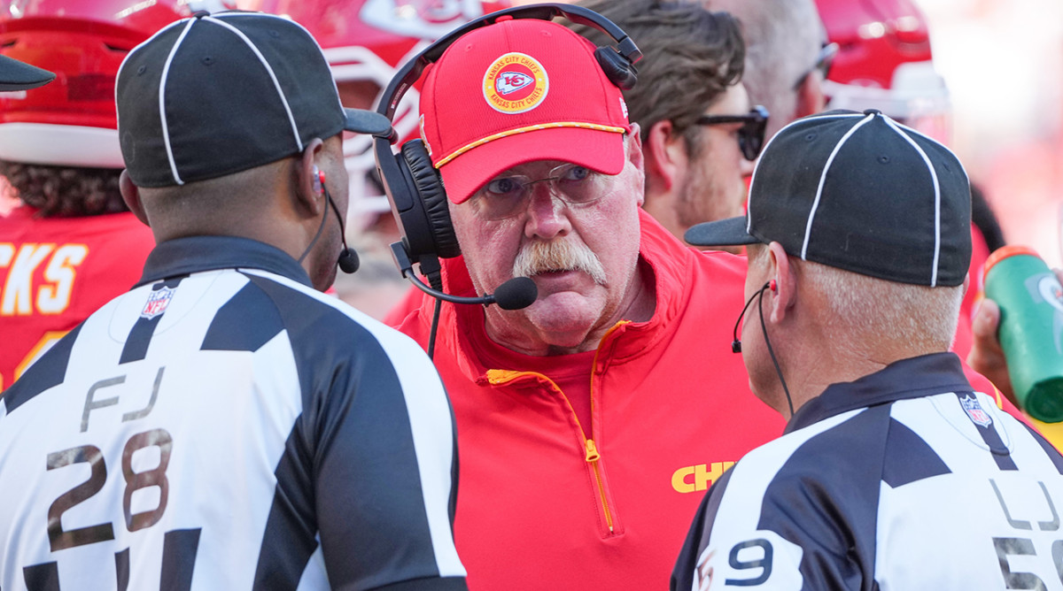 Kansas City Chiefs head coach Andy Reid talks with field judge Mark Hittner (28) and line judge Rusty Baynes (59) after a play against the Cincinnati Bengals at Arrowhead Stadium on Sept. 15, 2024.