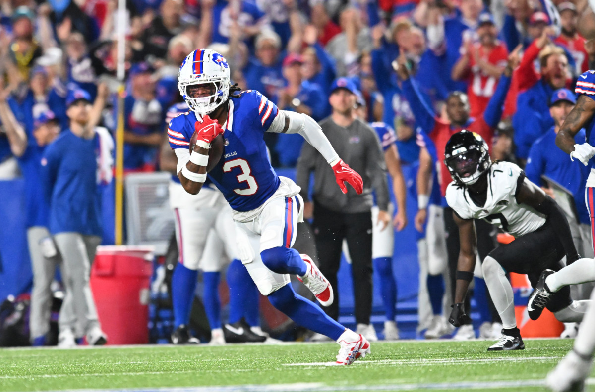 Sep 23, 2024; Orchard Park, New York, USA; Buffalo Bills safety Damar Hamlin (3) returns an interception against the Jacksonville Jaguars in the second quarter at Highmark Stadium. Mandatory Credit: Mark Konezny-Imagn Images