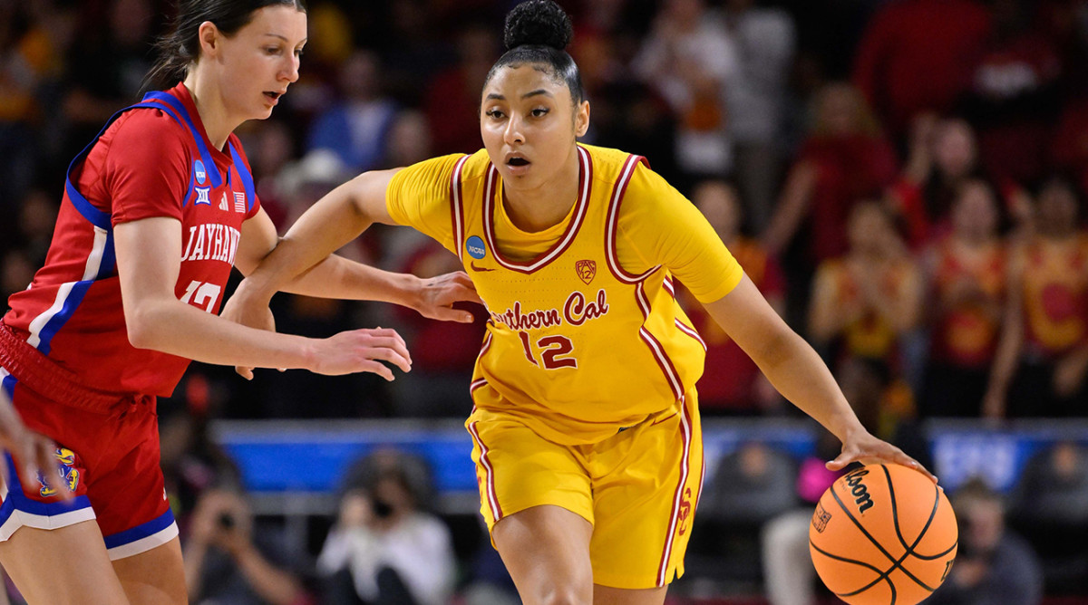 USC Trojans guard JuJu Watkins drives to the basket against Kansas Jayhawks guard Holly Kersgieter during an NCAA Tournament second-round game at Galen Center on March 25, 2024.